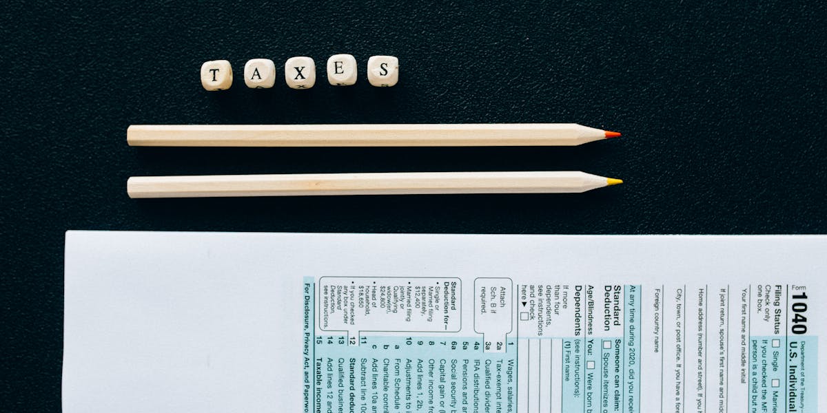 Tax forms and pencils representing SARS eFiling